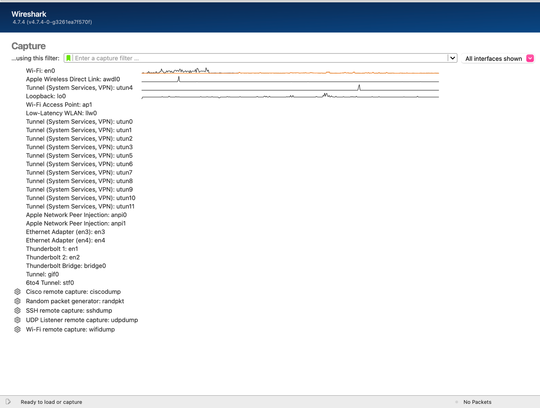 Wireshark's capture screen with Wi-Fi: en0 in the interface list